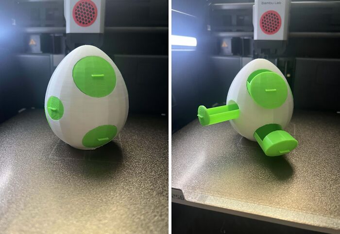A 3D printed white and green egg with a hidden compartment that opens, showcasing brilliant 3D printers.