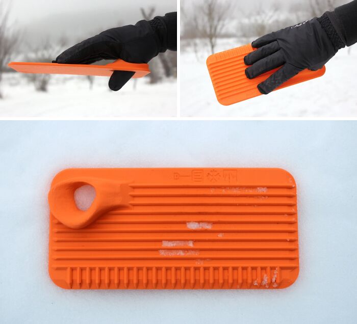 An orange 3D printed ice scraper in a snowy environment, highlighting brilliant things made with 3D printers.