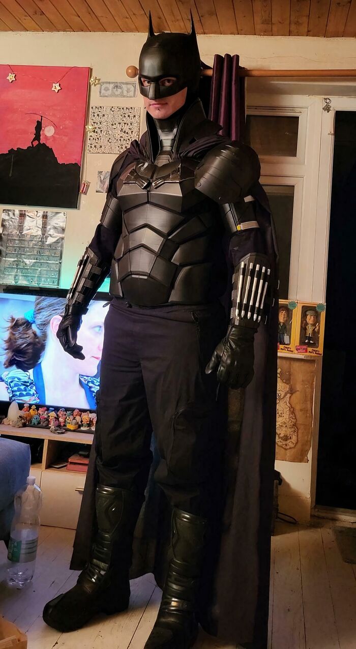 Person in a full Batman costume, showcasing brilliant 3D printers creativity for things they couldn't find.