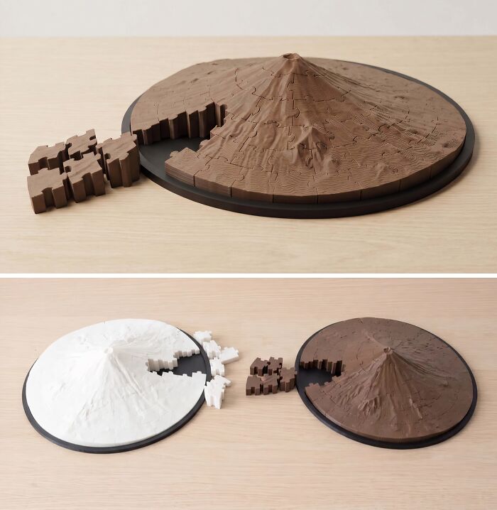 A brown 3D printed mountain puzzle with some pieces disassembled, showcasing the brilliant things people make with 3D printers.