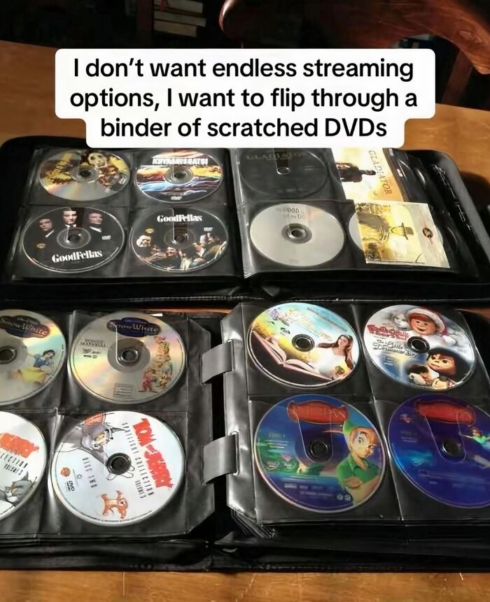 A binder full of DVDs, bringing nostalgia to people who experienced the magic of the 90s and 00s.