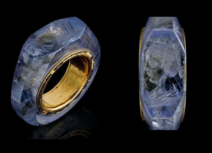 A detailed ancient sapphire ring with a carved profile, a wonderful example of the weird and wonderful world.