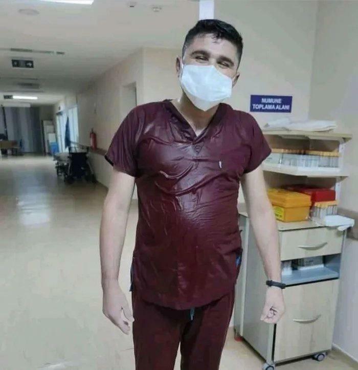 A healthcare worker in a wet uniform, depicting the wild and wonderful challenges faced in their profession.