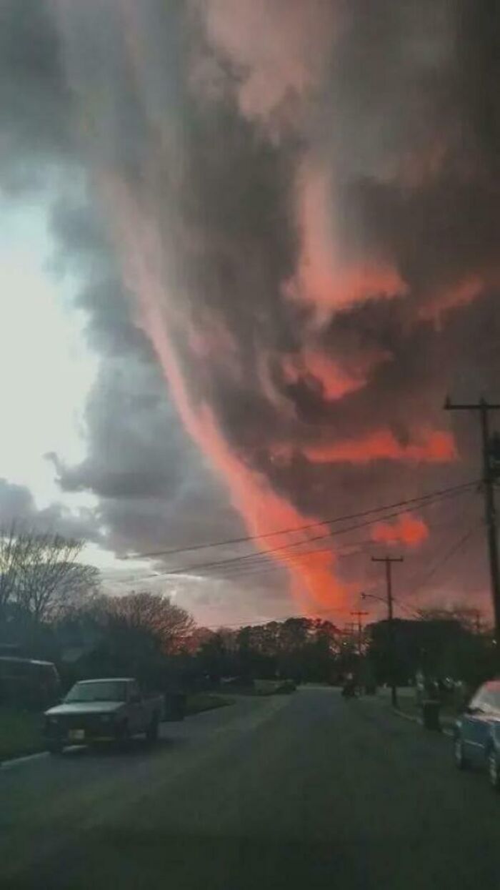 Cursed sky with ominous red clouds captured in a surreal photo