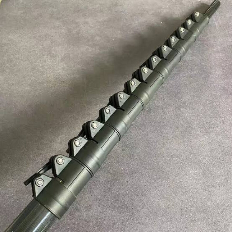 A detailed view of a telescopic pole, perhaps used in a creative side hustle.