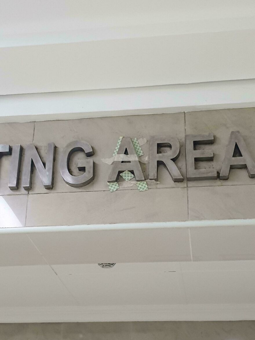 A sign with the letters TING AREA on a wall, showing a side hustle in property maintenance or signage.