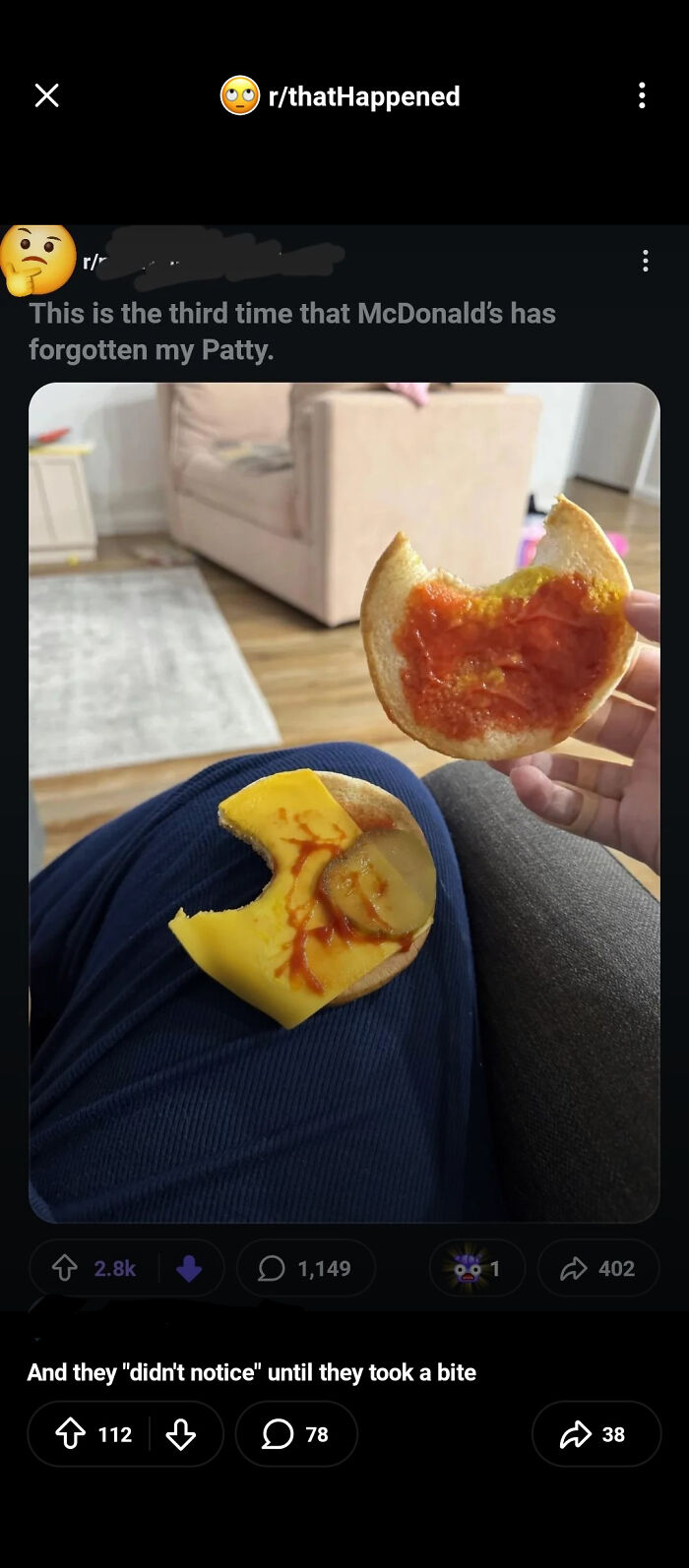 A Reddit post showing a bitten burger bun with cheese and sauce, missing its patty, highlighting people calling out others for lying.