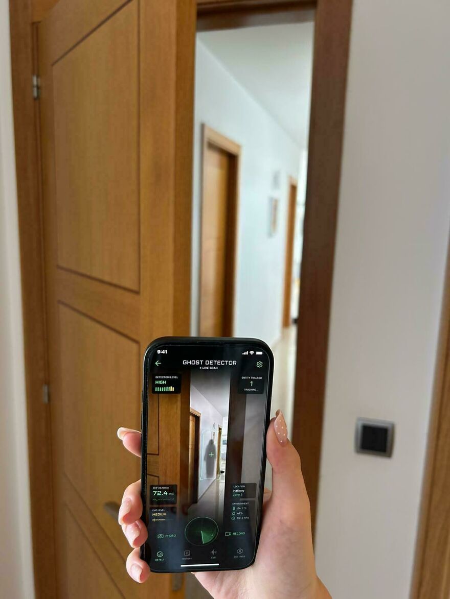 A phone displaying a ghost detector app, highlighting a weird side hustle.