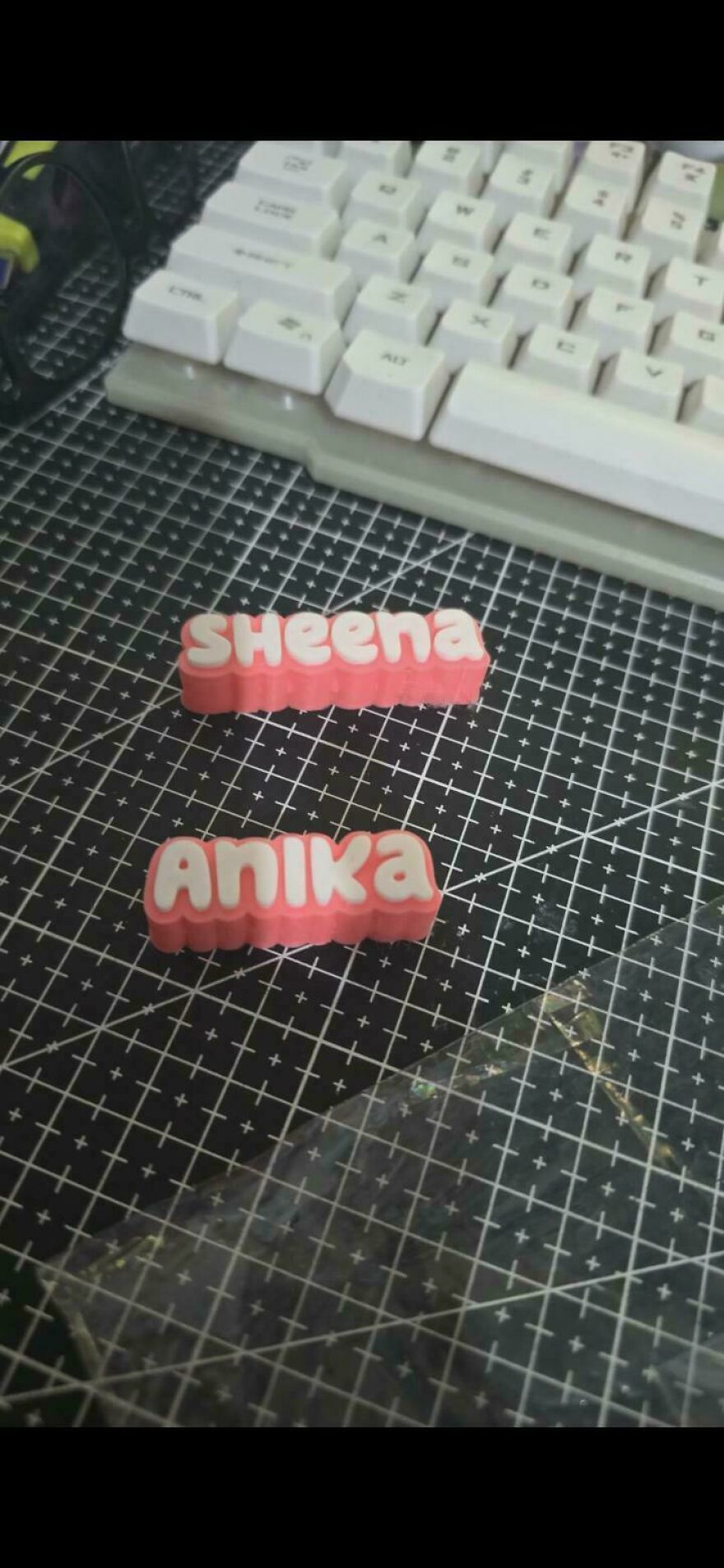 Handmade name tags for weird side hustles, Sheena and Anika.