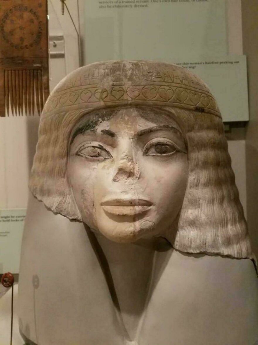 Strange things on Earth: An ancient Egyptian bust with a detailed wig and serene expression.
