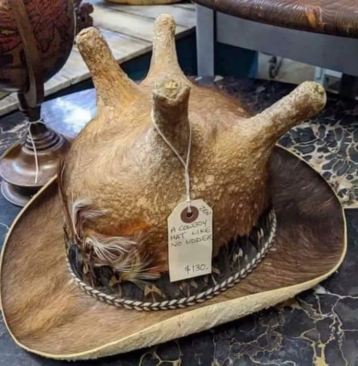 A bad fashion crime: a cowboy hat made to look like an udder, with a price tag of $130.