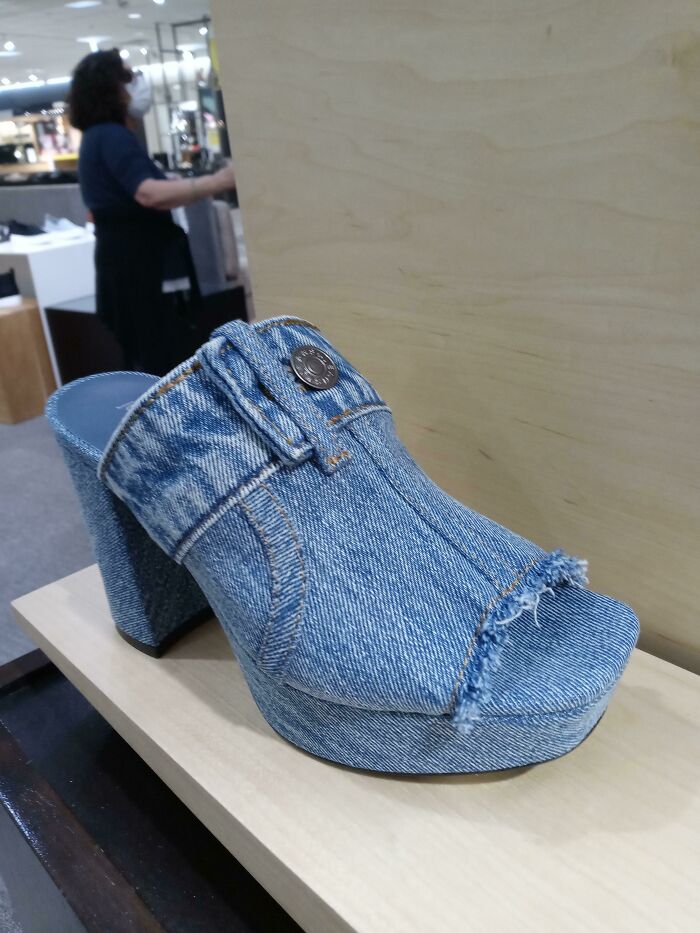 A denim high-heel shoe with frayed edges, an example of a bad fashion crime.