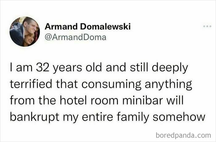 A travel meme about the fear of hotel minibar costs, a relatable experience for many travelers.
