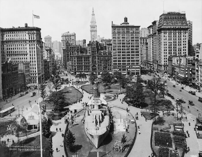 Interesting photo from history of Union Square in New York City, looking north, featuring a battleship