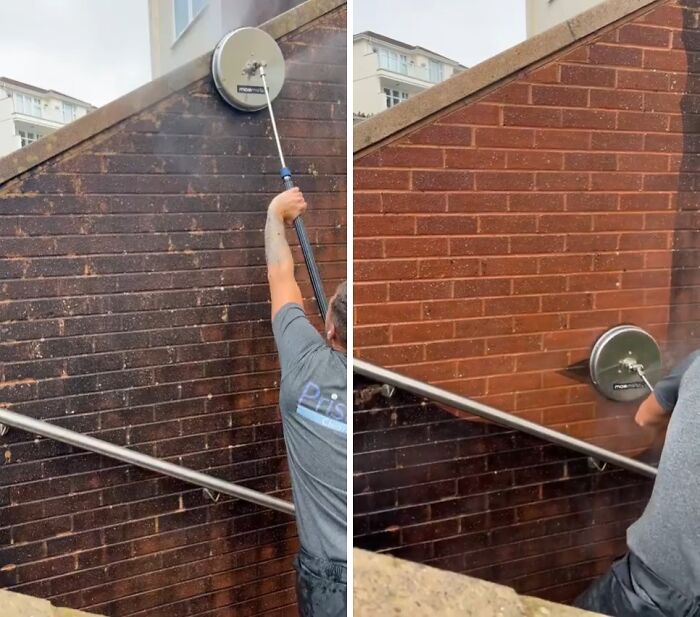 A person performing power washing on a brick wall using a circular surface cleaner for satisfying results.