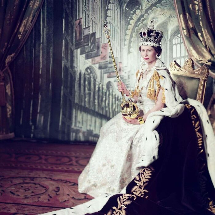 Queen Elizabeth II seated in coronation regalia, a beautiful and interesting photo from history.