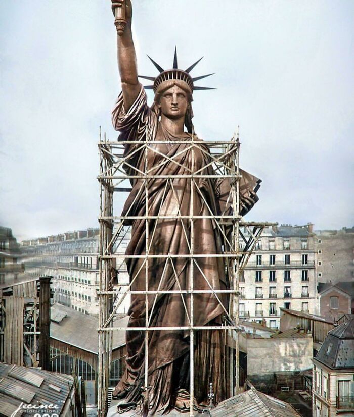 The Statue of Liberty under construction in Paris, a fascinating historical image before its journey.