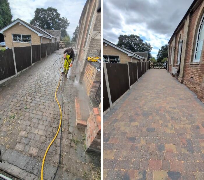 Satisfying power washing of a grimy brick driveway, revealing its clean and vibrant pattern.