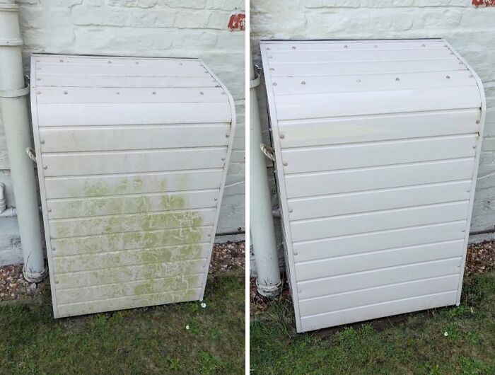Satisfying power washing of a grimy outdoor utility box, removing green growth for a clean finish.