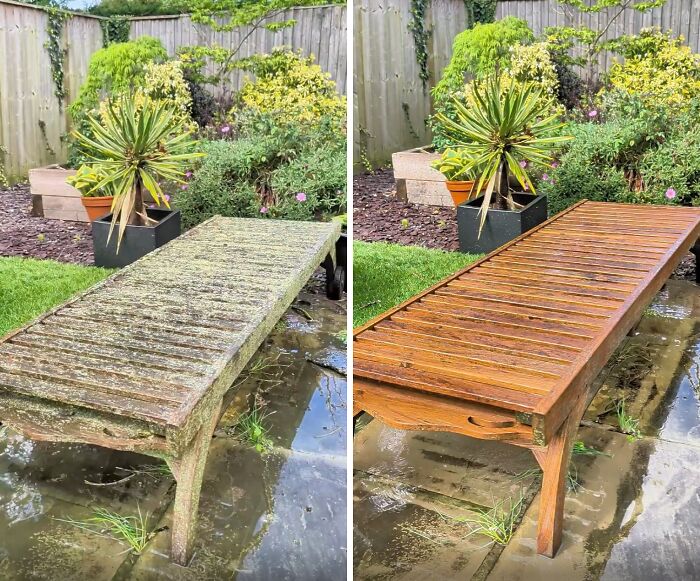 Power washing a moss-covered wooden garden bench to reveal its clean, natural wood finish.