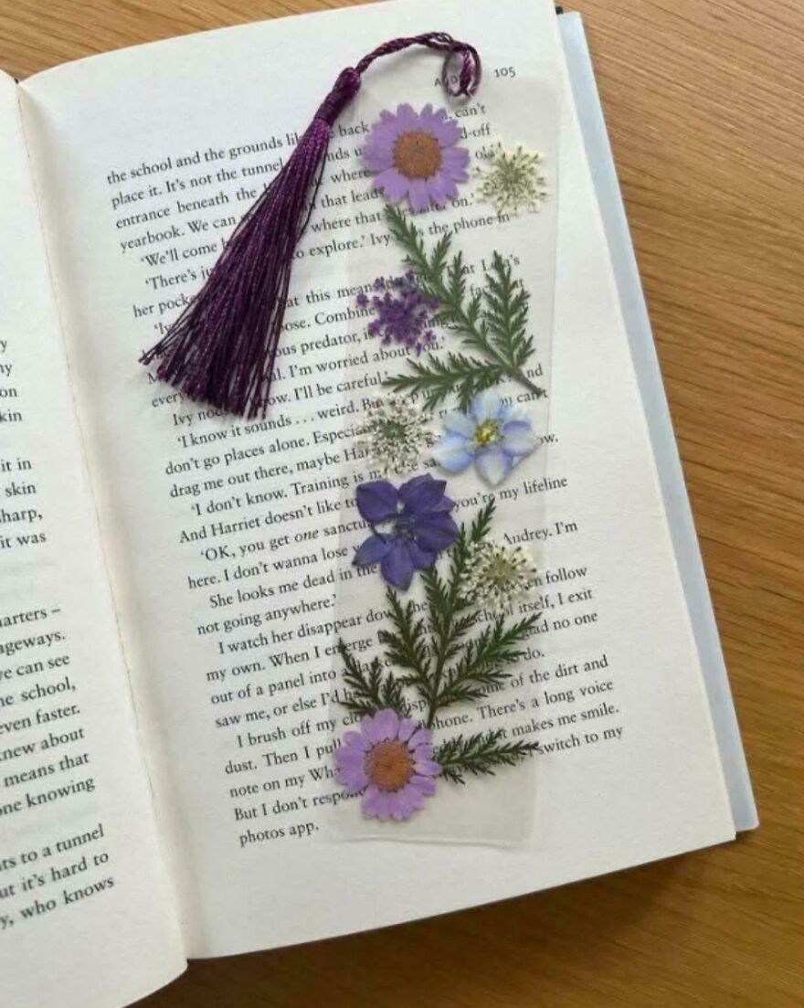 An open book with a beautiful pressed flower bookmark, perfect for a crafty side hustle.