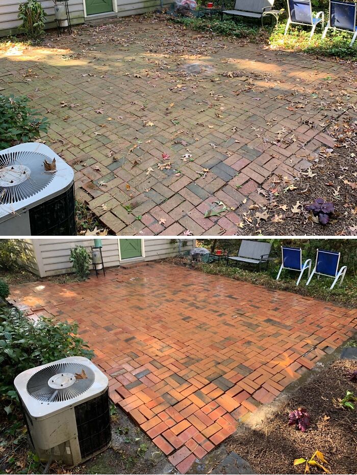Power washing transforms a dirty brick patio with leaves into a clean, inviting outdoor space.