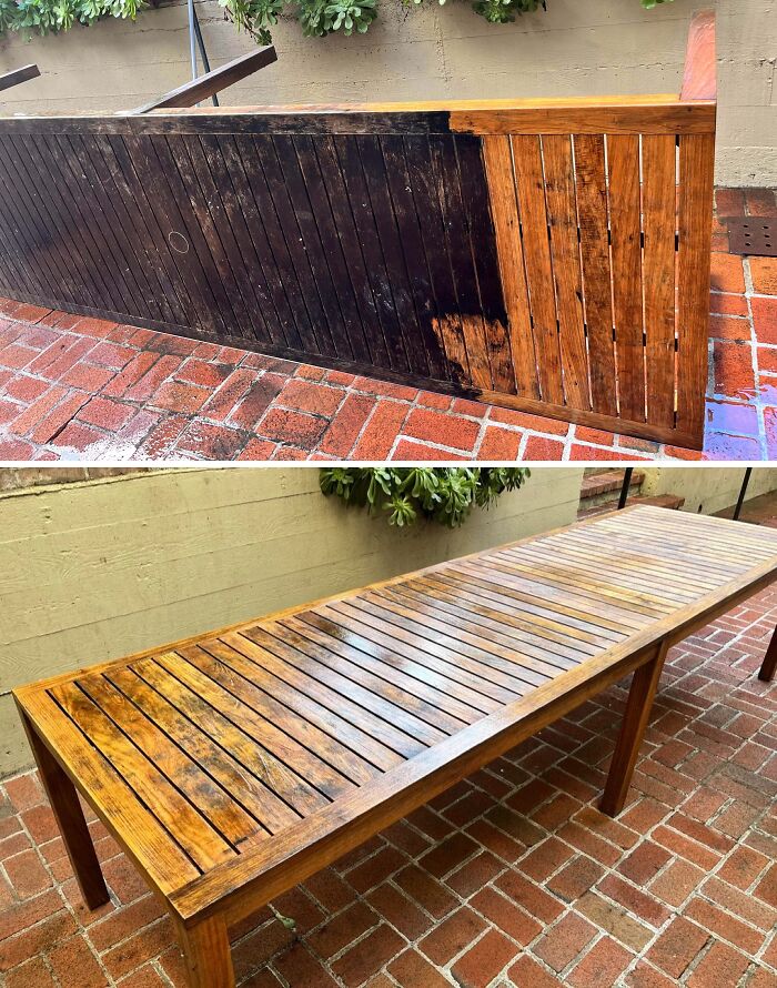 A power washing job on a wooden outdoor table, highlighting the dramatic revitalization from dirty to clean.