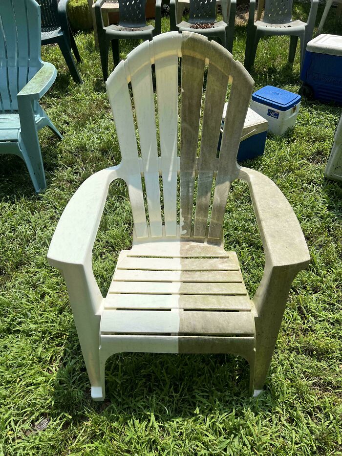 A before and after power washing image of a white plastic Adirondack chair, half dirty, half clean.