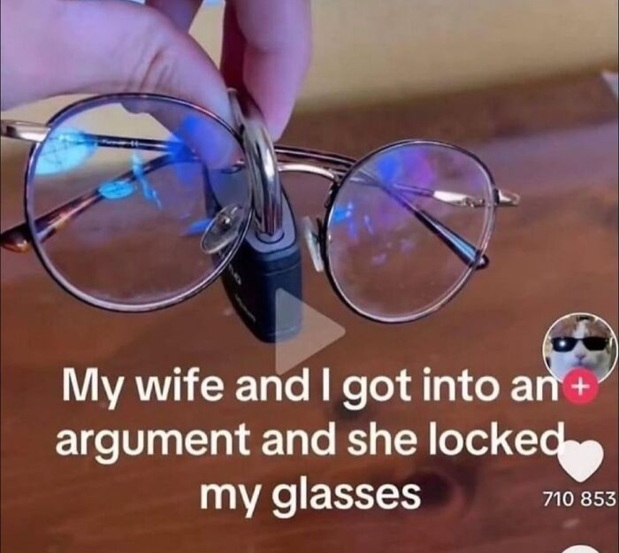 Hilarious memes: A hand holding eyeglasses locked with a small padlock.
