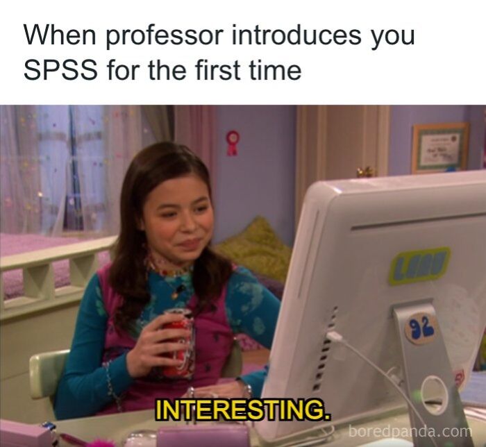 A girl looking at a computer screen that says INTERESTING, a funny stats meme for data enthusiasts.