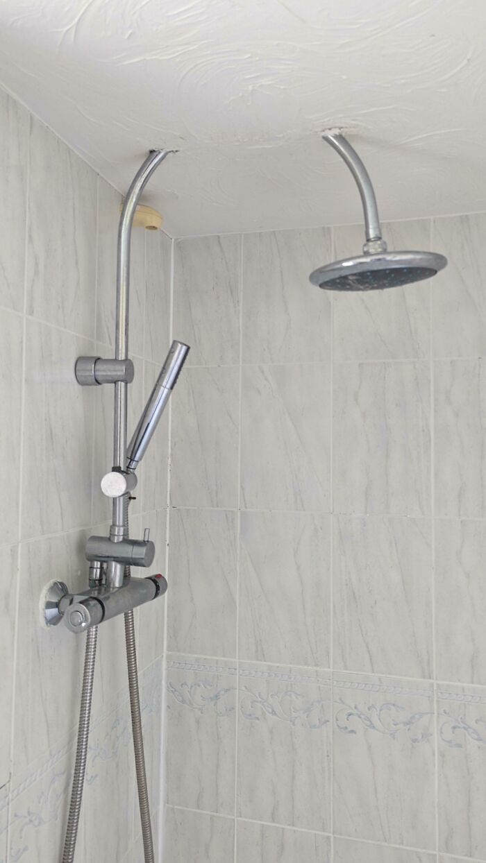A modern shower head and controls, representing the effort people put into renovating their homes and achieving amazing things.