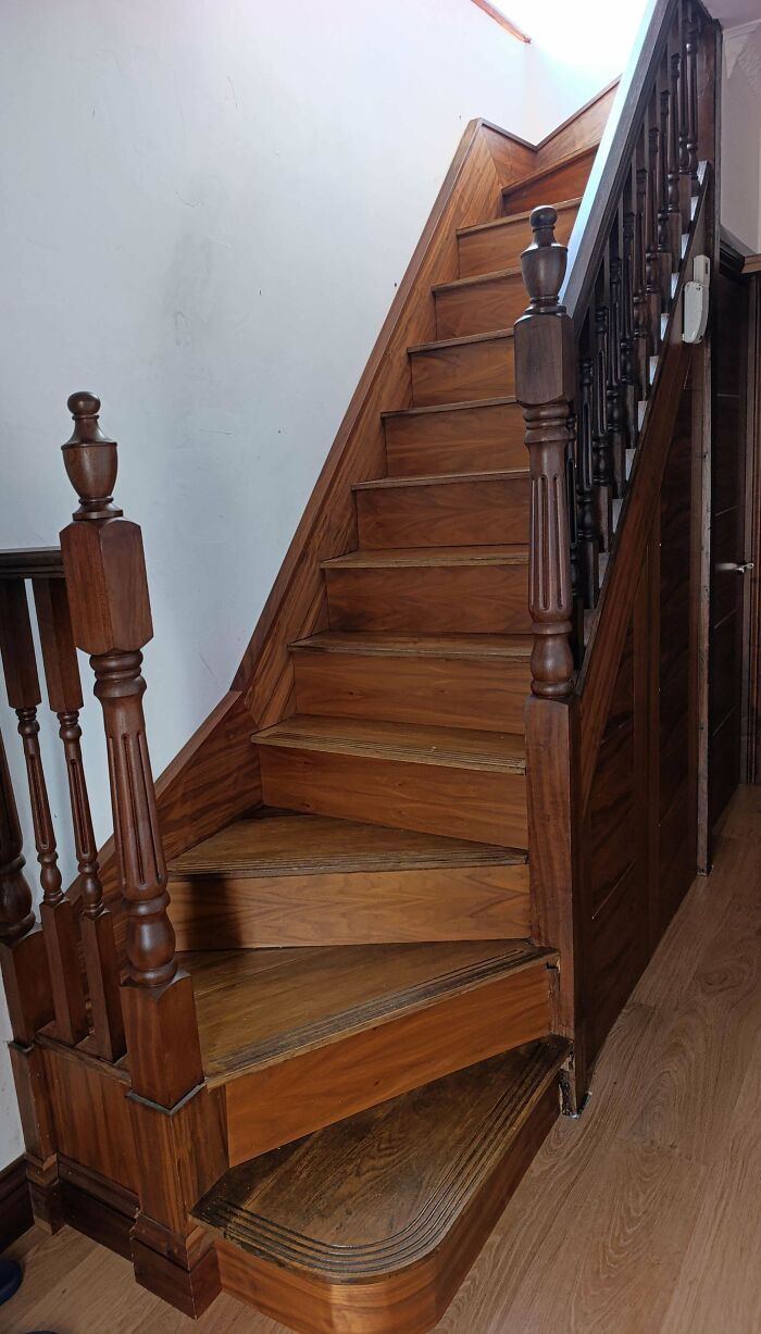 Image of a wooden staircase, highlighting the intricate craftsmanship and effort put into home renovations.