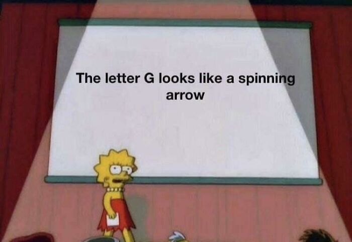 Lisa Simpson pointing at a whiteboard with text saying The letter G looks like a spinning arrow, a fascinating find.