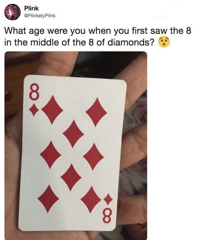A playing card showing the 8 of diamonds, highlighting a hidden 8 in the middle of the diamonds, a fascinating find.
