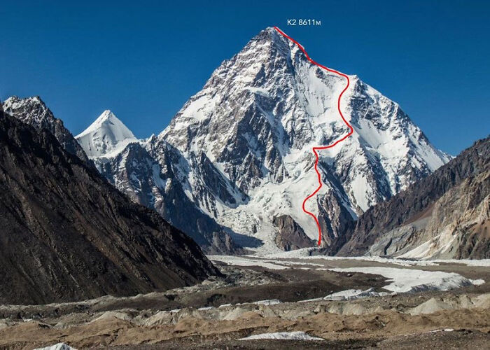 An aerial view of K2 mountain with a red line indicating a climbing route, a fascinating find for adventurers.