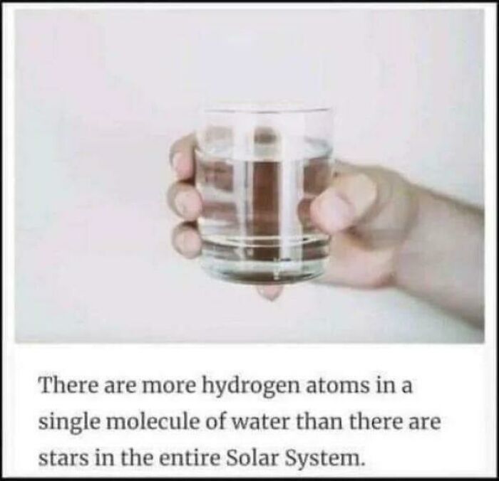 A hand holding a glass of water with text stating fascinating finds about hydrogen atoms.