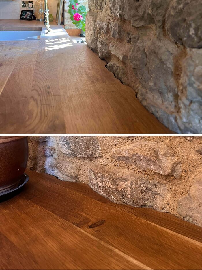 Before and after of a rustic home renovation, showcasing people putting effort into their homes with exposed stone and new wood. This home renovation transformed the space beautifully.