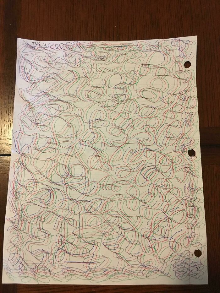 A white paper with intricate red, green, and blue swirly patterns, a fascinating find that creates an optical illusion.