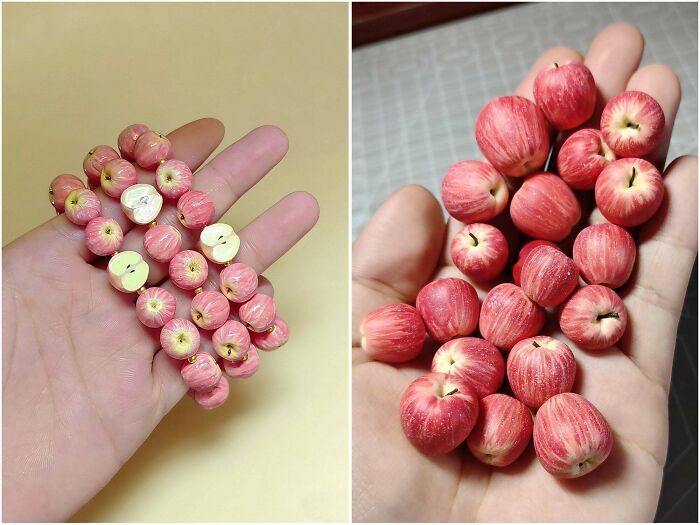 Tiny, realistic miniature apples held in a palm, showcasing detailed handmade projects.