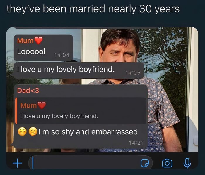 A text message conversation where Mum says I love u my lovely boyfriend, and Dad replies I m so shy and embarrassed, an unhinged meme.