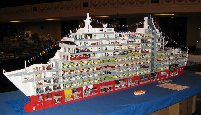 A surprising photo of an object cut in half: a detailed Lego cruise ship revealing interior cabins and decks.