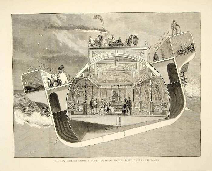 Interesting photo of a ship cut in half, revealing its inner saloon with people inside.