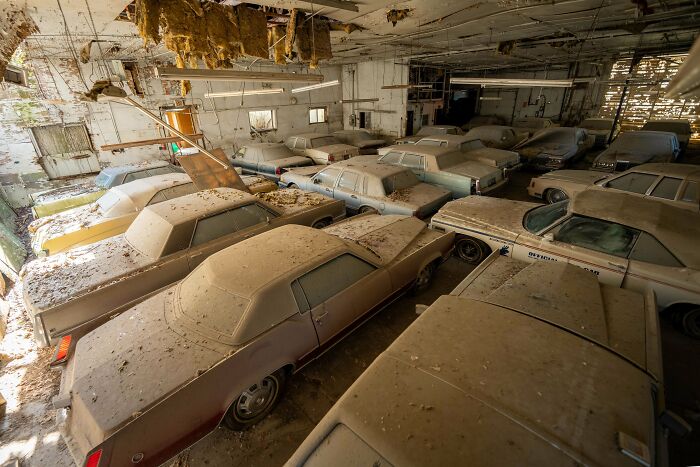 Exploring abandoned places reveals a dusty garage full of forgotten cars, something very unexpected.
