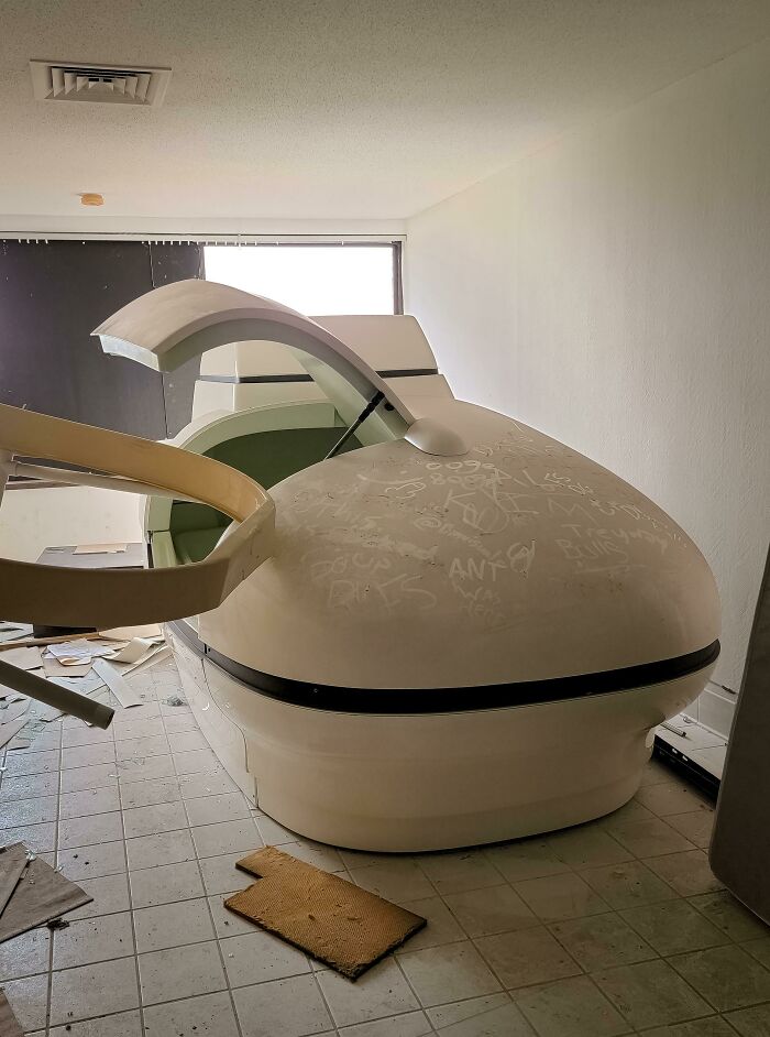 Exploring abandoned places, a derelict room with a large pod, something very unexpected.