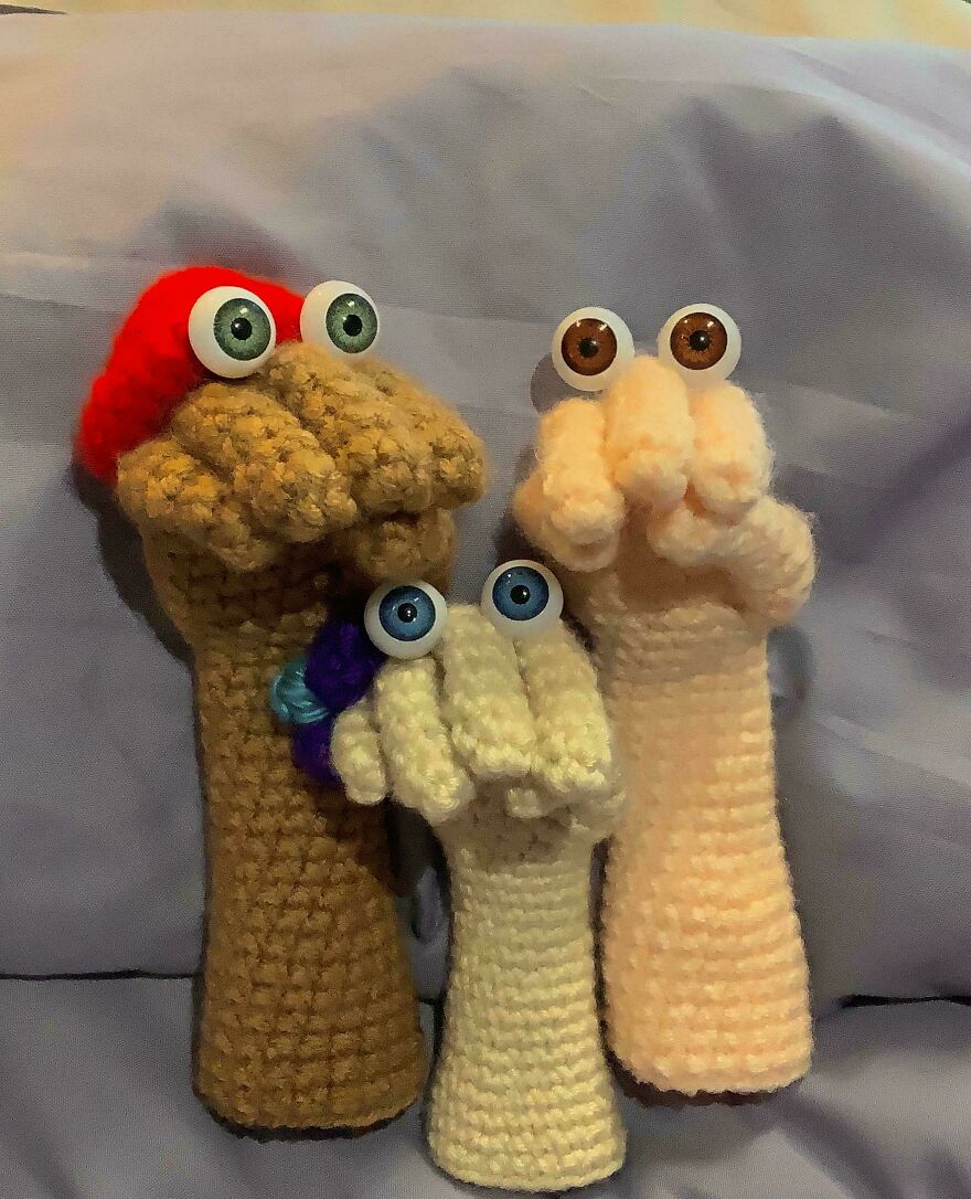 Three crochet creations with googly eyes, looking quirky and humorous.