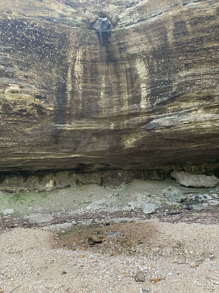 A natural rock overhang with water dripping, the trips didn't go as planned