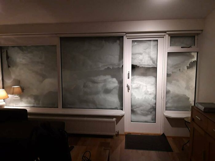 A room with windows covered in a cloudy pattern, representing trips that didn't go as planned.