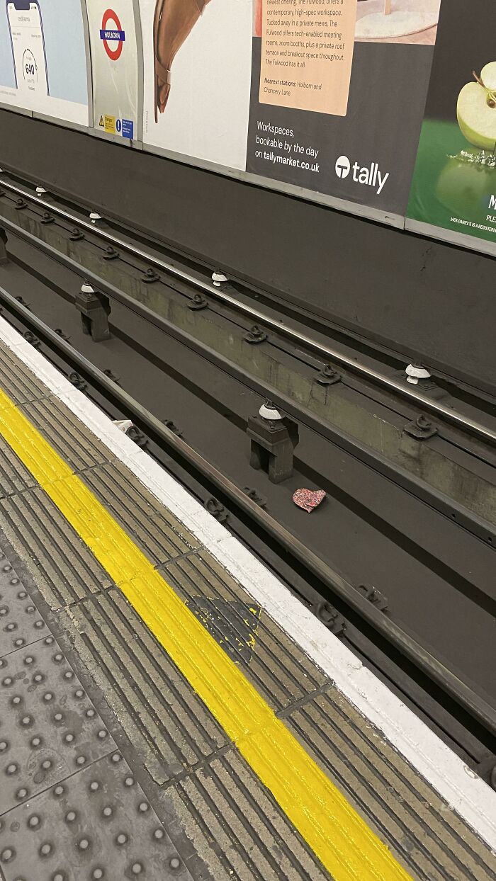 A discarded mask lies on the subway tracks, a trip that didn't go as planned.