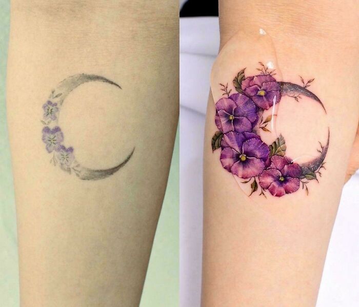 A simple crescent moon tattoo with light flowers is expertly covered with rich purple blossoms, an incredible tattoo cover-up.