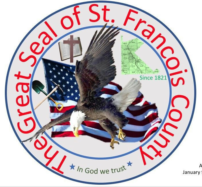 The Great Seal of St. Francois County, featuring an eagle, American flag, map, and a bible, a design fail due to complexity.